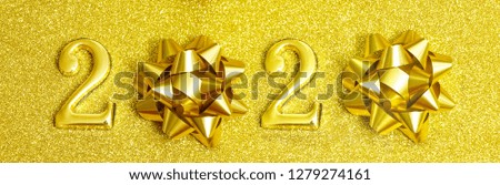 Golden image luxury text 2020. Happy new year. Gold Festive Numbers Design. yellow texture. Gold shining glitter confetti. Happy New Year Banner with 2020 Numbers for greeting card, calendar 2020