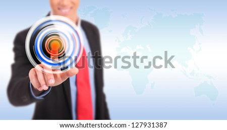 Businessman pressing circle button on a virtual background