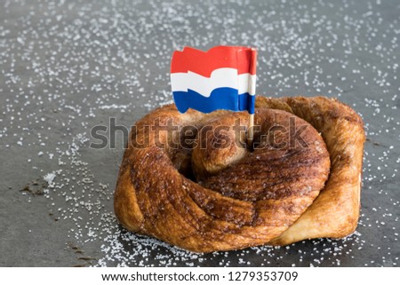 traditional Dutch cinnamon, sugar bread in a roll, called Zeeuwse Bolus Royalty-Free Stock Photo #1279353709