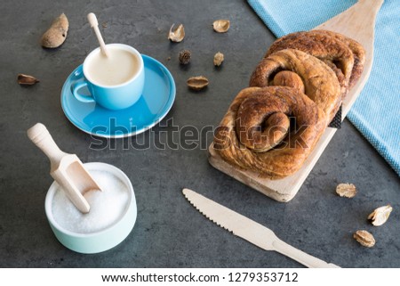 traditional Dutch cinnamon, sugar bread in a roll, called Zeeuwse Bolus Royalty-Free Stock Photo #1279353712