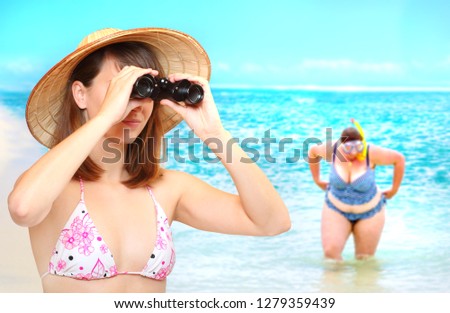 Young woman as a coastguard with binocular watching on beach. Summer in tropical paradise. Travel and insurance concept. 