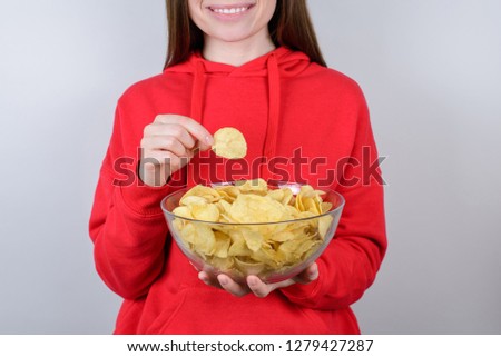 Cinema rest relax chill free time break leisure concept. Cropped closeup photo of cheerful excited glad nice person teen holding big bowl in hands isolated gray background