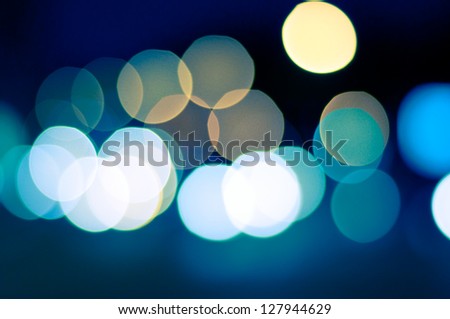 sparkling and defocused lights background. blue bokeh background. abstract blurred lights Royalty-Free Stock Photo #127944629