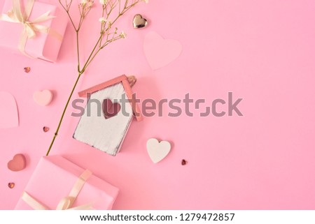 Valentines day background with a lot of different hearts and gift box over pink background.