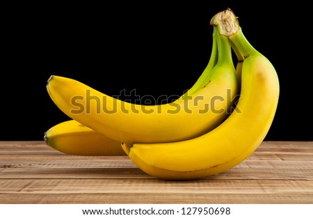 bananas on a wooden table