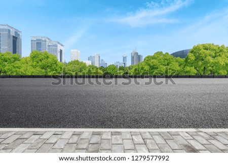 Urban road and modern commercial buildings in Shanghai