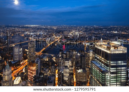 Brooklyn bridge and Manhattan bridge at night amazing aerial view of New York City USA