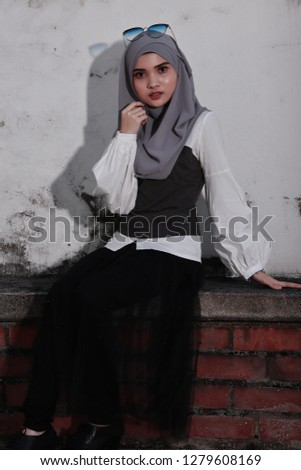 beautiful young Asian women with hijab. Street style fashion. 