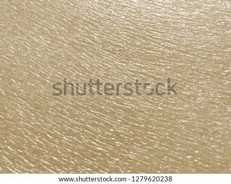 beautiful texture emboss blurred background of close up foam sheet in light yellow color, plastic foam sheet background beige color, focus and blurred texture background light yellow color