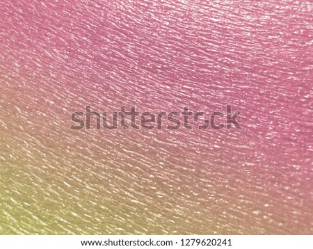 beautiful texture emboss blurred background of close up foam sheet in colorful color, plastic foam sheet background yellow and pink color, focus and blurred texture background sweet gradient colors