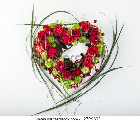 Beautiful flower arrangements for winter, spring, summer and autumn with colored backgrounds of red, purple and wintry white Royalty-Free Stock Photo #127963031
