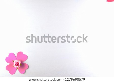 Hand-made pink love hearts and pink flowers isolated on white wooden texture background, Happy valentine's day. holiday background, Flat lay, top view, copy space