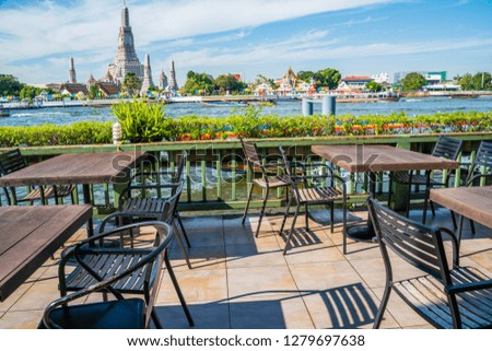 Outdoor restaurant with temple of dawn view point riverside, Bangkok Thailand