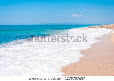 Beautiful Greek beach. Wonderful seascape view, turquoise water, sunny day