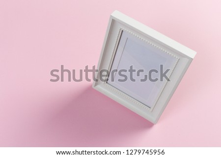 white frame on pink background