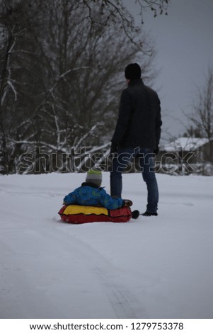 Air inflatable sledding in the winter.