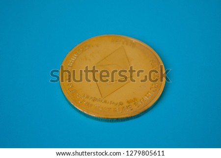 Crypto currency coins on blue background