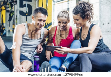 Group of sportspeople taking a self picture after a workout 