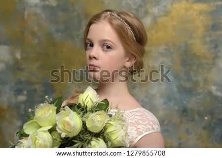 blonde girl with a bouquet of roses in her hands
