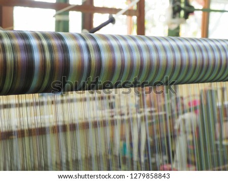 Silk threads weaving, selective focus
