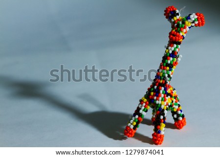 African Hand Made Toy Of a Giraffe Shadow Casting
