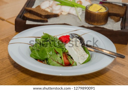 appetizers and salads on the table in the restaurant