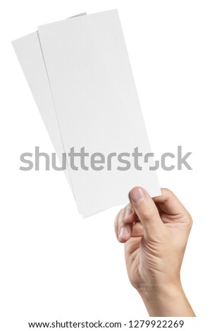 Hand holding two blank sheets of paper (tickets, flyers, invitations, coupons, banknotes, etc.), isolated on white background
