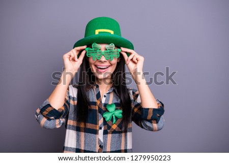 Portrait of nice attractive lovely stylish trendy cheerful straight-haired lady wearing checked shirt enjoying lifestyle life having fun touching funny glasses isolated over gray pastel background