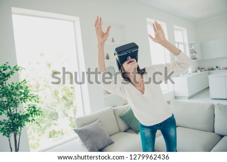 Close up photo of wonderful pretty brunette she her lady wearing virtual reality device watching space galaxy planets on ceiling wearing casual jeans and white pullover