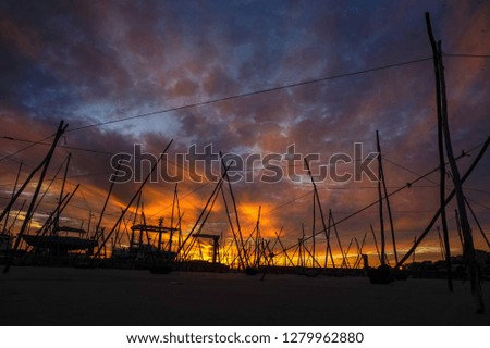Sunset color just before summer storm with the clothes dryer cables completly empty at Porto, Portugal