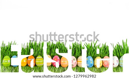 Easter font. Word "Easter" with transparency of green grass and Easter eggs