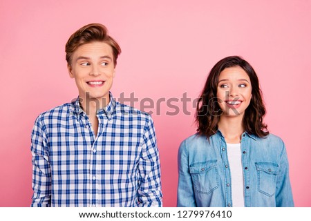 Portrait of nice sweet charming lovely attractive cheerful cheery positive confused flirty couple isolated over pink pastel background Royalty-Free Stock Photo #1279976410