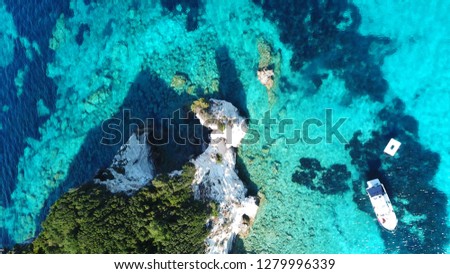 Aerial drone photo of tropical volcanic white rock deep turquoise paradise bay with beautiful colors and tropical nature
