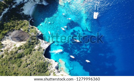 Aerial drone photo of tropical volcanic white rock deep turquoise paradise bay with beautiful colors and tropical nature