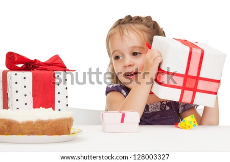bright picture of beautiful litle girl with birthday cake