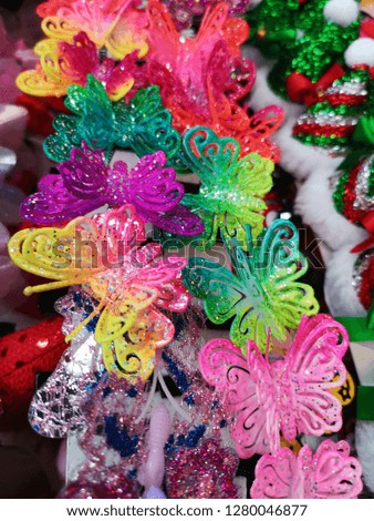 Colorful butterfly hair clip
 Royalty-Free Stock Photo #1280046877