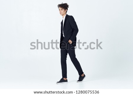 Business man in a suit in full growth                    