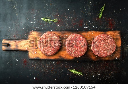 Burger steak cutlets on a dark background