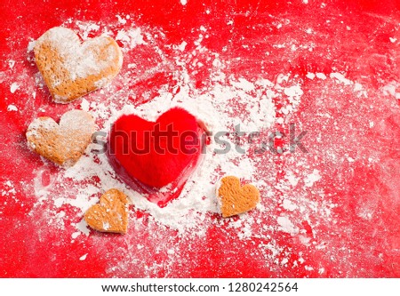 Valentine's red background decorative, Heart shape cookies and white icing flour, Valentine's day gift bakery concept, blurred fluffy heart pillow for card or creative design.