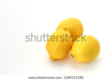 Three ripe lemons isolated on White Background, empty space