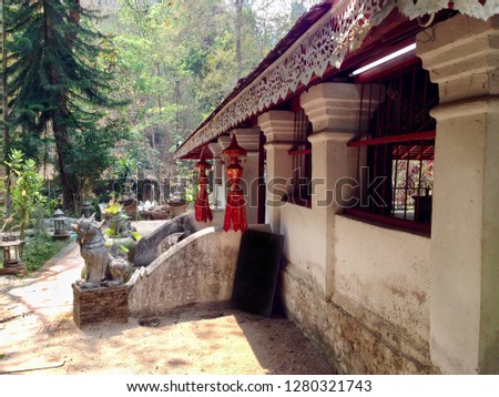 old temple in the forest of high mountains in the northern Thailand with beautiful unique designs of lanna architecture (Thai northern style)