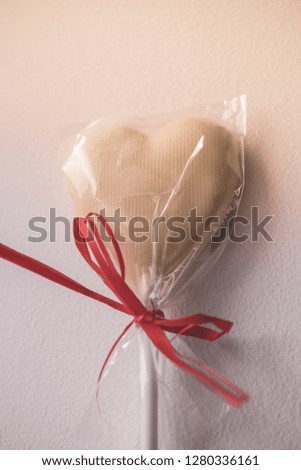 white chocolate heart on the stick