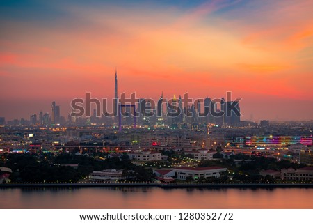 Beautiful skyline of Dubai city at sunset/night in United Arab Emirates