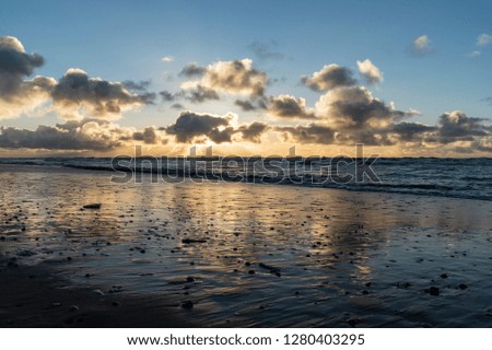 Sunset on the beach on the North Sea coast