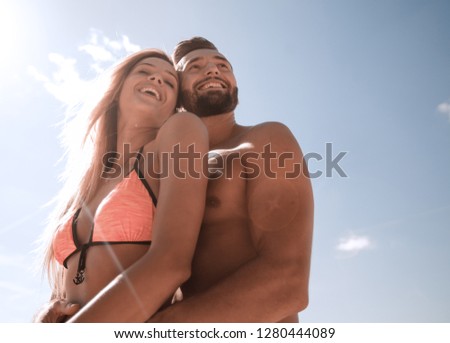 Picture of  happy couple embracing.
