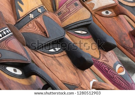 Melanesia, Papua New Guinea, Sepik River area, Murik Lakes, Karau Village. Traditional carved wooden masks that the area is famous for. Royalty-Free Stock Photo #1280512903