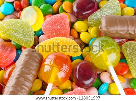 Mixed colorful candies background Royalty-Free Stock Photo #128051597