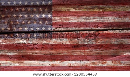 weathered grunge USA flag on an old wooden wall