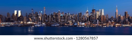 New York City Aerial Skyline Panorama showing the west side of midtown Manhattan, as seen from New Jersey across the Hudson River. Created from 3 stitched images.