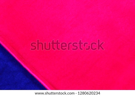 Blue and pink tissue fabric background. Copy space